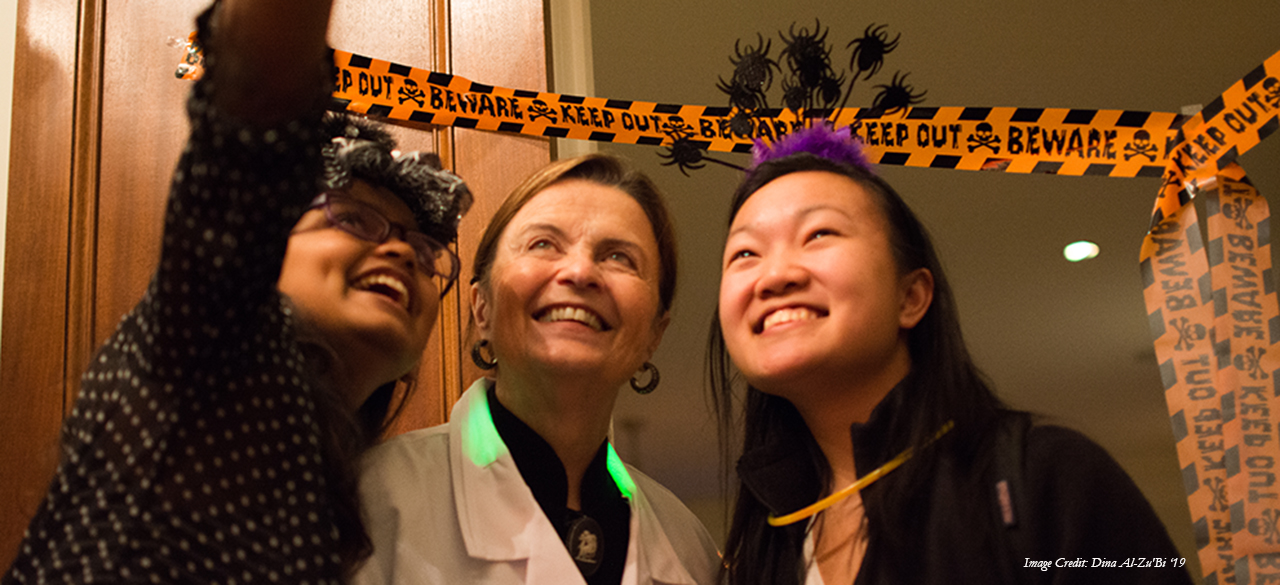 Trick or Treat at the President’s House President Bottomly takes a "selfie" with trick or treating students