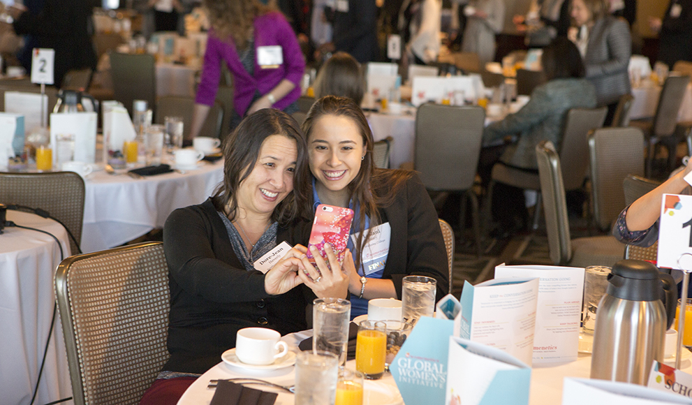 Student Chosen As Finalist In National Essay Contest Leilani Stacy ‘18, a finalist in a national essay contest, snaps a picture with her mother at a gathering hosted by the contest’s sponsoring organization, Womenetics.