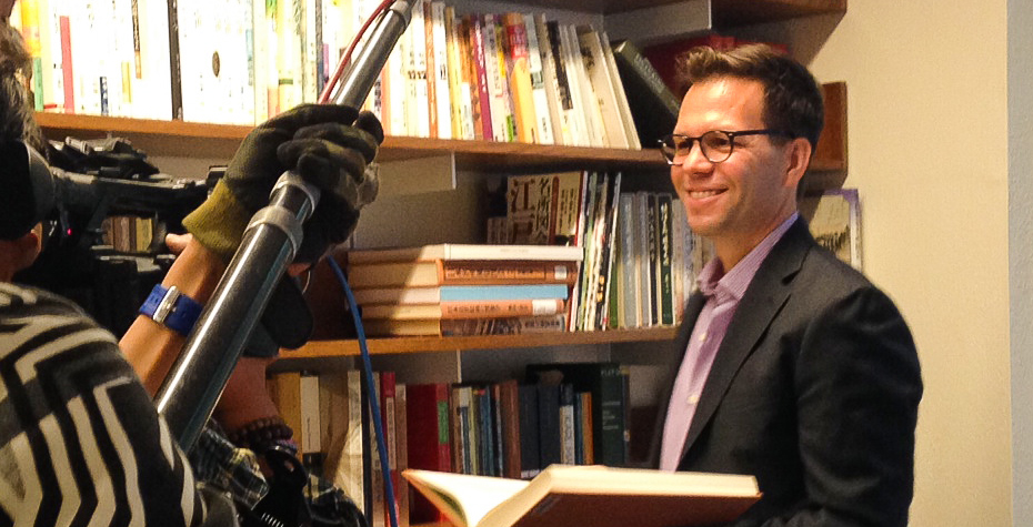 Wellesley Professor Guest Judges Japanese Game Show Robert Goree in his office with the Sushi Time crew