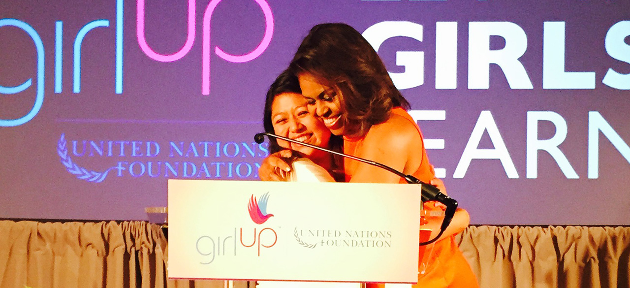 Rocio Ortega '16 receives a hug from First Lady Michelle Obama