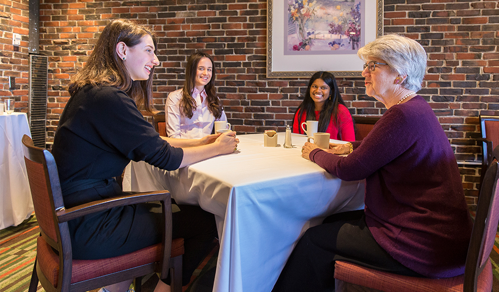 Pforzheimer Fund Internships Provide Students with Valuable Humanities Work Experiences Students talk with Betty Pforzheimer '59