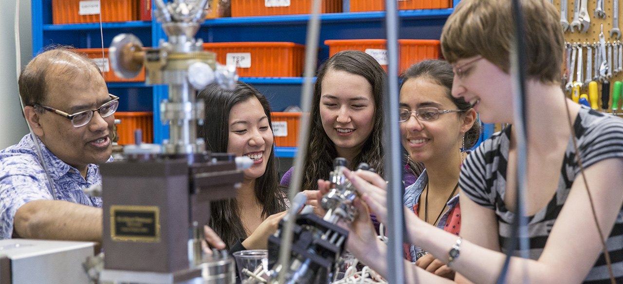 The “Chemistry of the Heavens” Chris Arumainayagam, professor of chemistry, with students in his lab