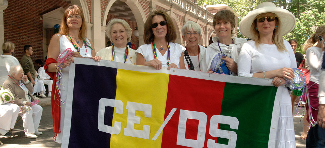 Davis Degree Program Celebrates 45 Years Continuing Education/Davis Scholar Alumnae hold a banner reading CE/DS