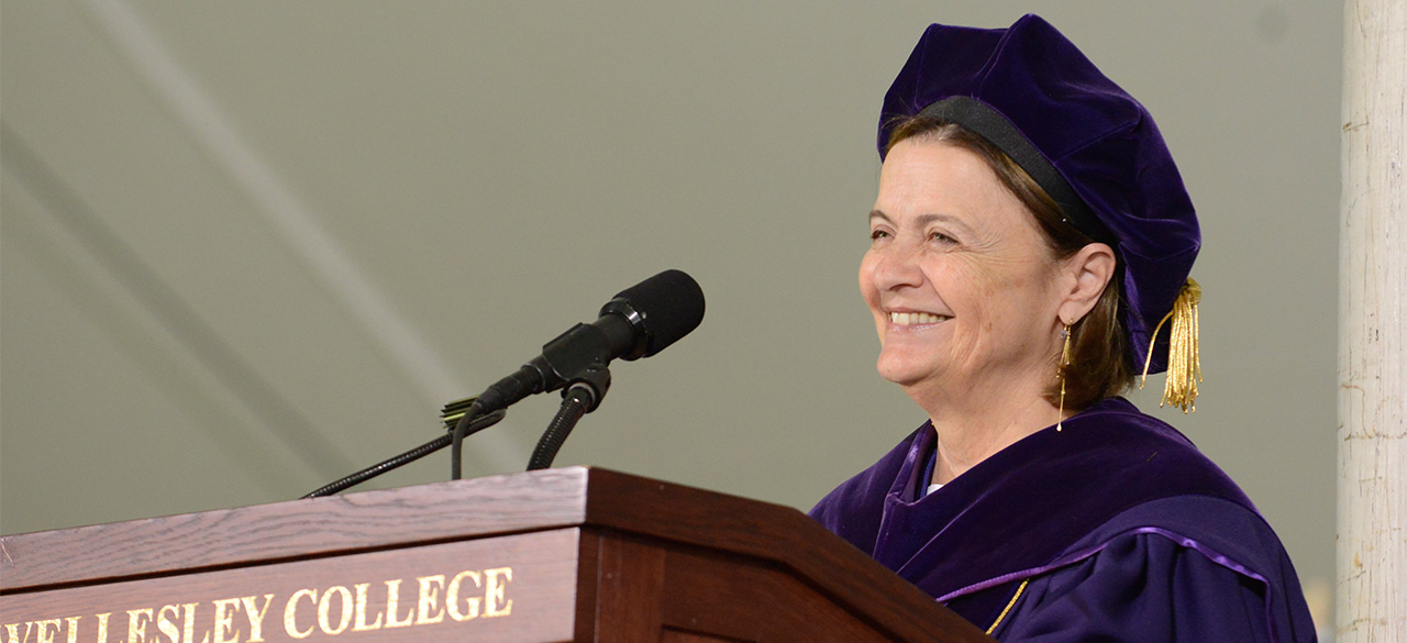 A Photo Farewell to President H. Kim Bottomly President H. Kim Bottomly in commencement regalia