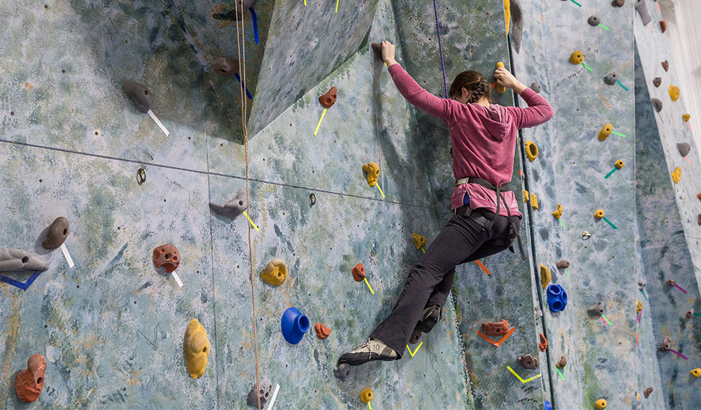Exercise Enhances Students’ Lives, on Campus and Beyond Rock climbing demonstrated by Katherine Morris ’17