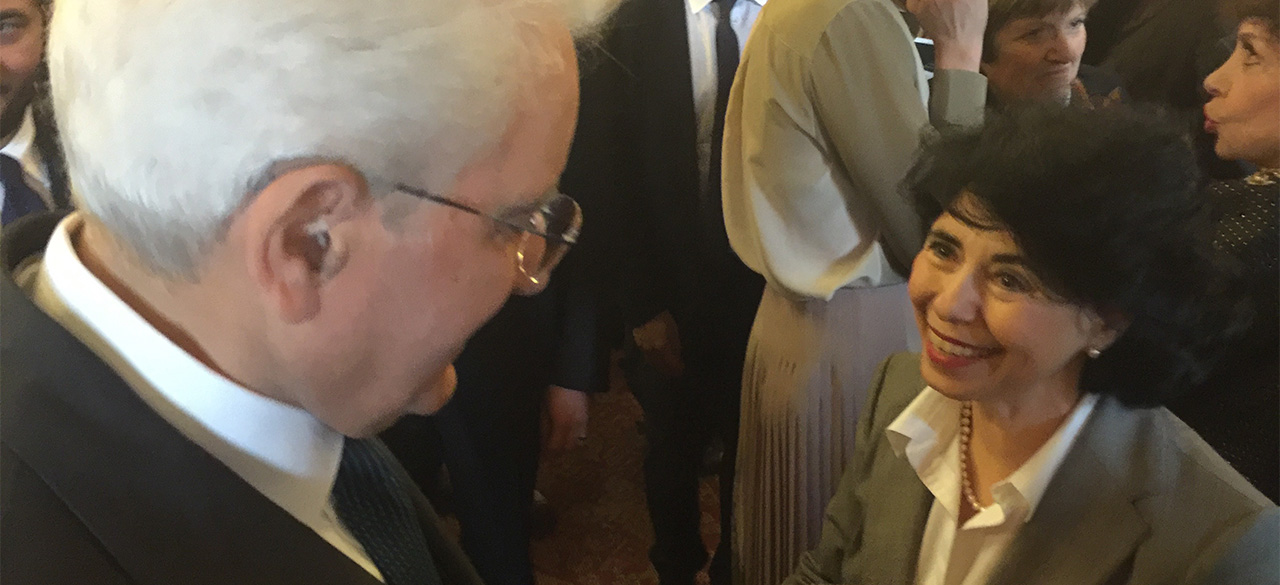 Senior Lecturer Flavia Laviosa is congratulated by Italian President Sergio Mattarella 