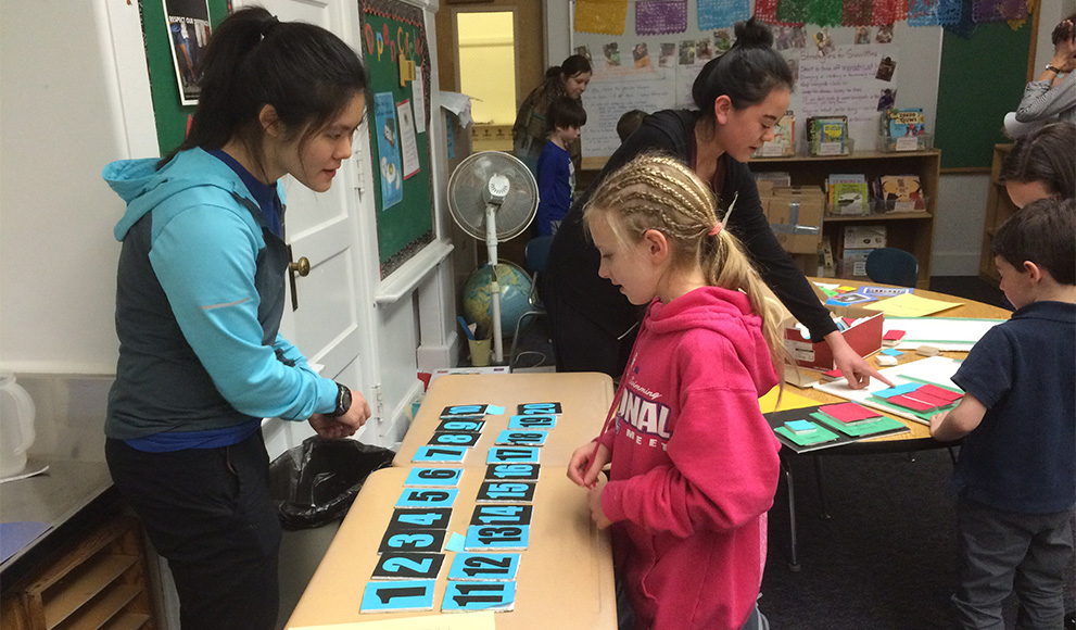 Wellesley Students Inspire Elementary School Kids With Hands-On Math Elizabeth Hau '16, left, and a student at John D. Hardy Elementary School