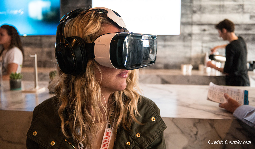 Alumna Creates Virtual Reality Museum Experiences Young woman uses virtual reality googles