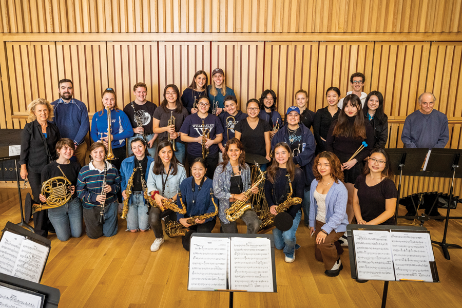 Musicians smiling and holding instruments