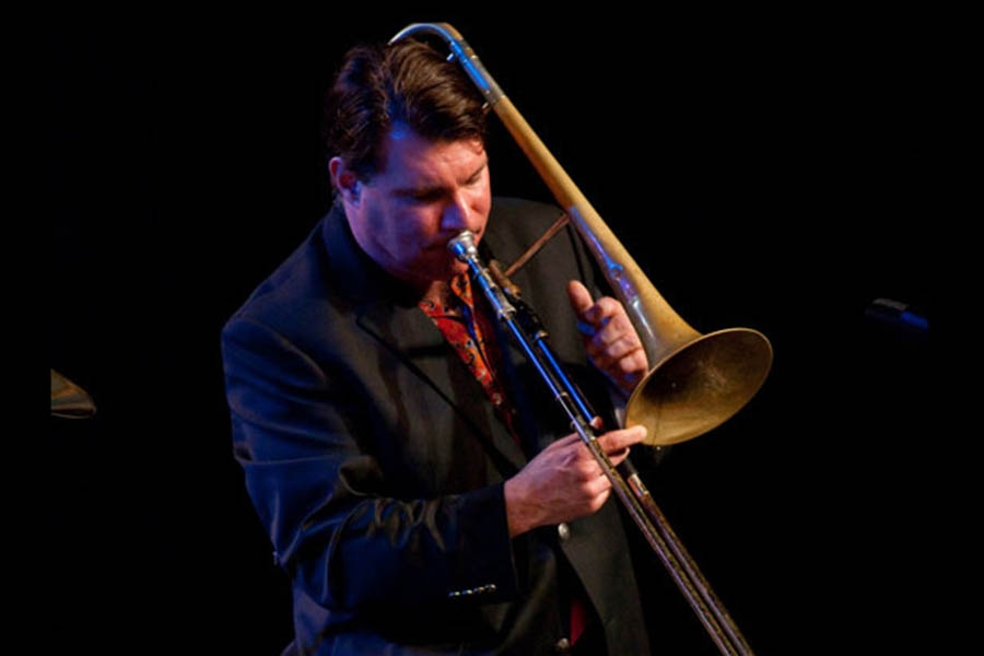 a man playing a trombone