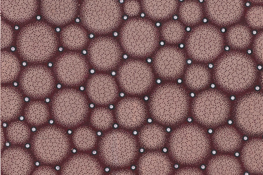 Textile design with a seamless pattern of circles and pearls