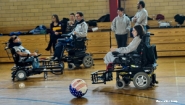 Staff Member's Power Soccer Team Takes First in Conference A photo of the Boston Brakers power wheelchair soccer team in action