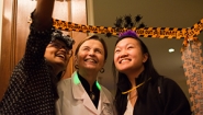 Trick or Treat at the President’s House President Bottomly takes a "selfie" with trick or treating students