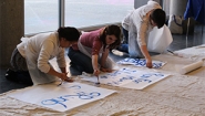 Wellesley students create signs for the 2016 Boston Marathon Scream Tunnel