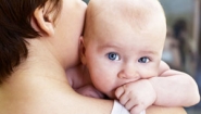 baby over mother's shoulder