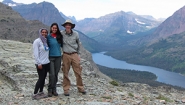 Alden Griffiths and two students at research site