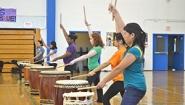 students in drumming practice