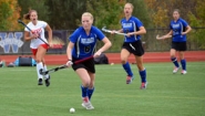 Wellesley field hockey players take ball upfield