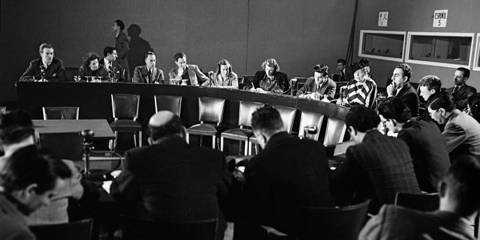 On Human Rights Day, Wellesley Professor Asks Us to Help Humanity Thrive Eleanor Roosevelt and other leaders sit in conference after completing the Declaration of Human Rights.