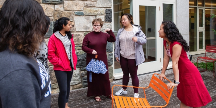 Meet Helen Wang, Wellesley’s New Director of Residence Life and Housing Helen Wang talks with a group of students outside Bates Hall.