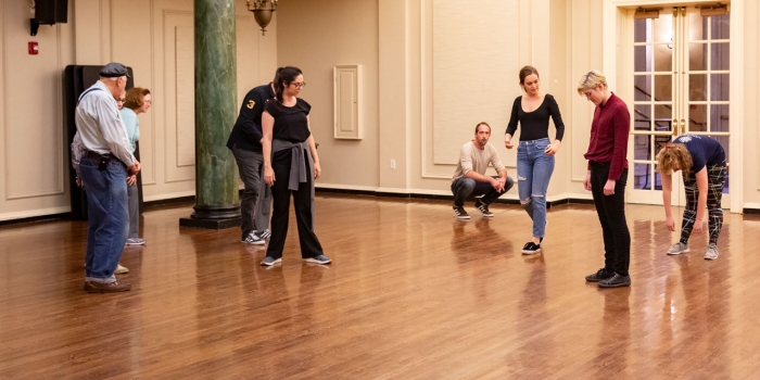 Shakespeare Troupe Returns to Wellesley to Perform “Hamlet” Actors From The London Stage rehearse with Wellesley students in a practice space.