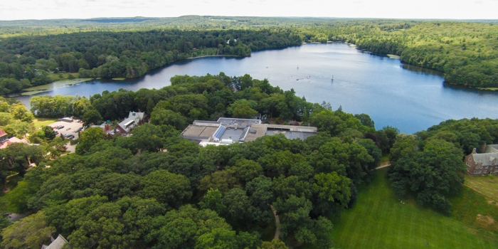 Students and Faculty to Deliver Recommendations to Board Subcommittee on Fossil Fuel Investments An ariel photo of campus with Lake Waban in the distance