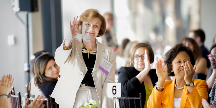 Harriette Chandler ’59 Receives Lifetime Achievement Award from Massachusetts Public Health Association Harriette Chandler waves to a crowd.