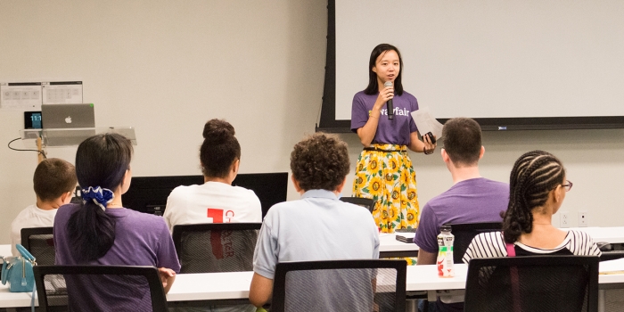 Karina Lin ’19 Encourages Wayfair to Bring Diversity to the Tech Industry Karina Lin speaks in front of a classroom of middle school students.