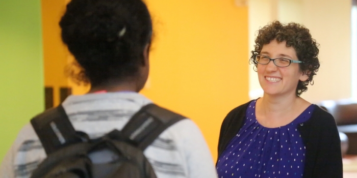 Wellesley Welcomes New Campus Rabbi and Jewish Chaplain Rabbi Dena Bodian speaks to a student in Tischman Commons