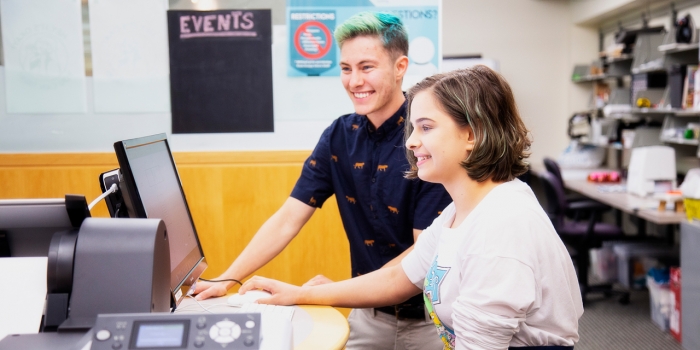 What Do Wellesley Students Do On Campus Over the Summer? A student and staff member work on a computer in Wellesley's Maker Space.