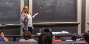 Wellesley and Northwestern Researchers Publish Report on Effects of Work Requirements on SNAP and Medicaid Recipients Professor Kristin Butcher teaches an economic class.