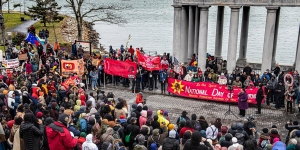 The Myth of Thanksgiving and National Day of Mourning People attend a demonstration for National Day of Mourning along the water in Plymouth, MA.