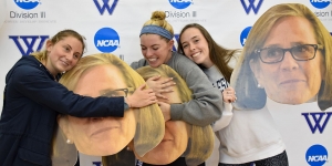 Wellesley Celebrates a Retirement and the End of the 2018-19 Athletic Season Student athletes pose hugging large cutouts of athletic director