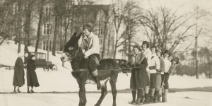 Wellesley Snow Inspires Winter Games A student on a donkey pulls a group of students on skis at Wellesley College