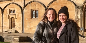 Two Years After Its Launch, The Wellesley Hive Continues to Thrive Two students stand outside a building in Oxford, England.