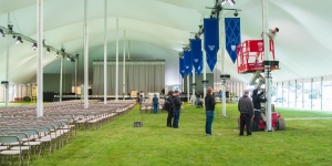 Wellesley College Inaugurates Paula Johnson as Its 14th President in a Ceremony that Celebrates the Vibrancy of a Liberal Arts Community staffers setting up the Inauguration tent