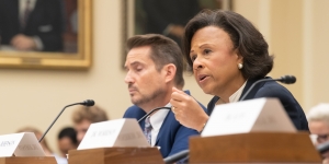 One Year after Report on Sexual Harassment in Academia, President Paula Johnson Testifies Before Congress on Findings and Bipartisan Legislation President Johnson speaks into a microphone while testifying on Capitol Hill.