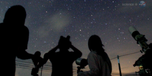 Summer Night Sky Features a Total Lunar Eclipse, Meteor Shower and a Close-up Look at Mars Star gazers watch the night sky during a meteor shower.