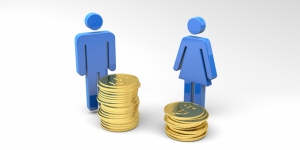 Wellesley Professor Joins WGBH Radio’s Callie Crossley ’73 to Discuss the Gender Wage Gap A figure of a man stands next to a stack of coins and a figure of a woman stands next a smaller stack of coins.