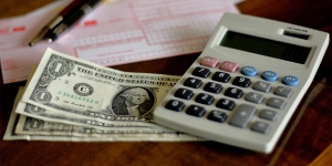 Time Magazine Partners With Wellesley’s Oscar Fernandez on New Interactive Tool to Resolve Financial Disputes money and calculator