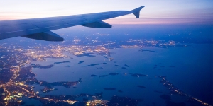 Summer Send-Offs Prepare New Students for the Journey to Wellesley An airplane preparing to land over Boston's Logan airport
