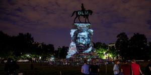 How a Summer of Protests Is Changing the Ways We Commemorate U.S. History, Including the Fourth of July Frederick Douglass’ image is projected on the Robert E. Lee Monument