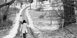 Wintersession 2019 Begins at Wellesley Two students walk a path at Wellesley College. There is a dusting of snow.