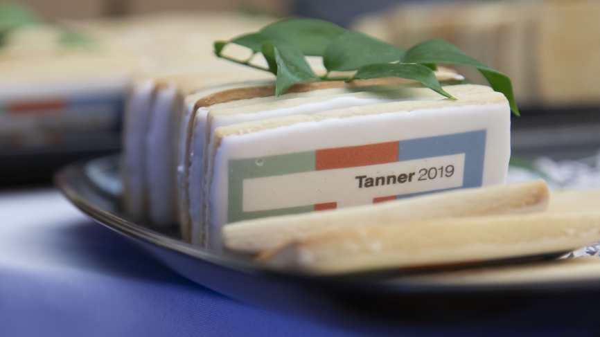 Cookies with the Tanner logo sit on a table.