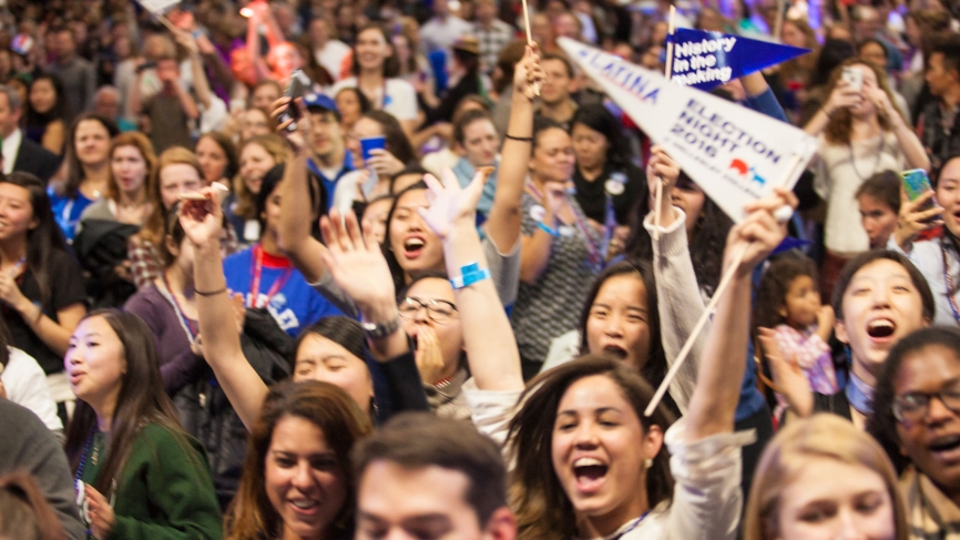 the crowd reacts to preliminary results