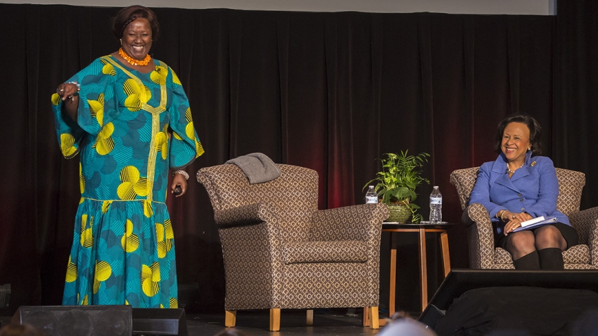 Wellesley College President Paula A. Johnson listens to Agnes Binagwaho on stage at the African Women's Leadership Conference