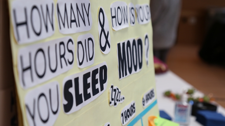 A poster that says, "How many hours do you sleep? and How is your mood?"