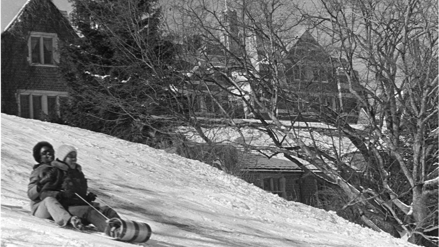 #WellesleyTradition 3: “Traying” down Severance Hill Wellesley students sled down Severance Hill.