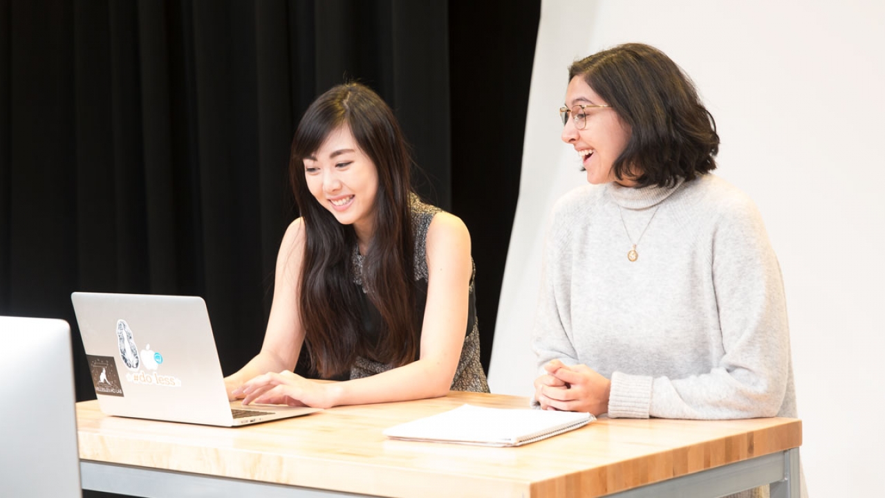Rachel Pak ’18 (above, left) and Anjali Sundaram ’18 (right) returned to campus after interning at CNBC last summer