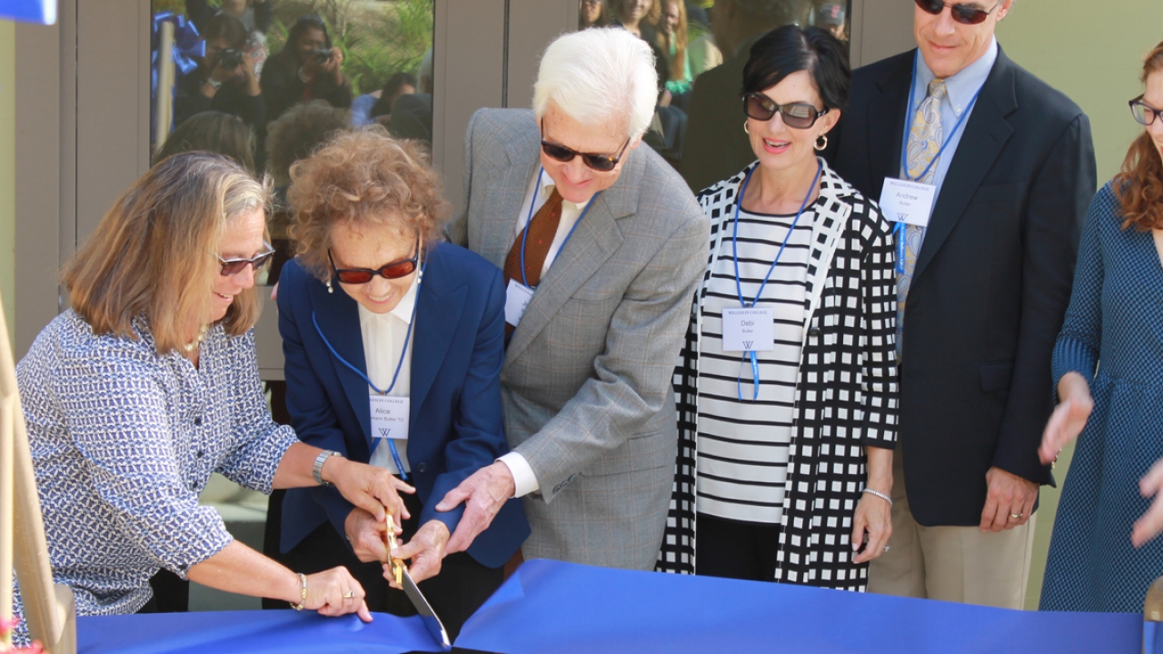 A ribbon cutting ceremony at the Butler Boathouse